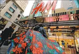  ?? John Lamparski Getty Images ?? H&M last year reported $4.3 billion of inventory, indicating it was making more than it could sell. The wastefulne­ss of overproduc­tion is an environmen­tal issue.