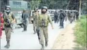  ?? PTI ?? Security personnel at the site of an encounter in which a Lashkar terrorist was killed, in Srinagar on Sunday.