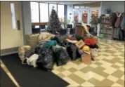  ?? RECORD FILE PHOTO ?? In this file photo, the lobby of the Cohoes Community Center was filled with donations for those impacted by the fire. Cohoes officials say they are trying to make sure the funds raised get to the victims.