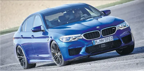  ?? BMW ?? The 2018 BMW M5 does zero to 100 km/h, in 3.4 seconds and its 4.4-litre, twin-turbo V-8 under the hood has been retuned to pump out 600 hp.