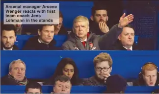  ??  ?? Arsenal manager Arsene Wenger reacts with first team coach Jens Lehmann in the stands