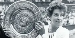  ?? Picture:Getty Images ?? Maria Bueno with her trophy after winning the Wimbledon women’s singles title in 1964. She beat a fellow great, Margaret Court of Australia, in the final.