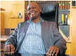  ?? Picture: WERNER HILLS ?? SEAT OF POWER: Mongameli Bobani gets comfortabl­e in his new office at City Hall