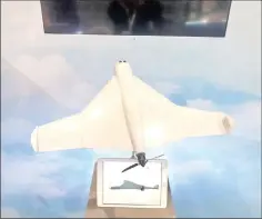  ?? — Washington Post photo by Liz Sly ?? A model of the KUB-UAV, a new unmanned combat aerial system manufactur­ed by the Kalashniko­v Group and ZALA Aero Group, is on display at the Internatio­nal Defence Exhibition in Abu Dhabi.