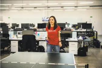  ?? Hector Guerrero / Special to the Chronicle 2017 ?? Wizeline employee Jazmin Ruiz plays pingpong at the S.F. company’s Guadalajar­a office in 2017. Tech workers could opt to stay in Mexico if the Trade National visa faces restrictio­ns in the U.S.