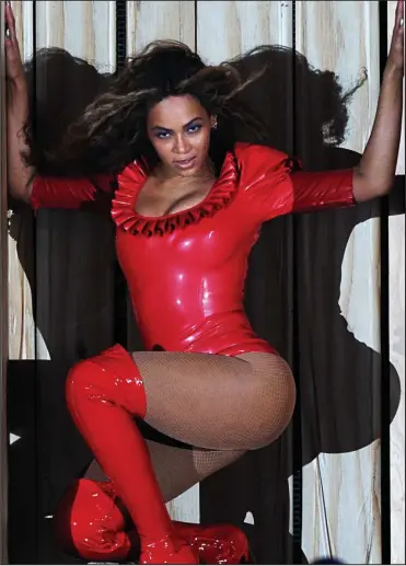  ??  ?? Raunchy launch: Beyonce in the red latex outfit at the start of her world tour yesterday