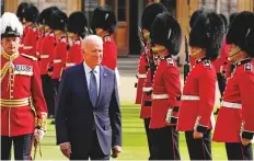  ?? AP ?? ■
US President Joe Biden inspects a Guard of Honour after arriving to meet Queen Elizabeth II at Windsor Castle.