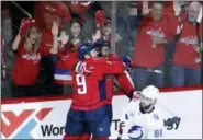  ?? ALEX BRANDON — THE ASSOCIATED PRESS ?? Washington Capitals defenseman Dmitry Orlov (9), from Russia, and right wing Devante Smith-Pelly (25) celebrate Smith-Pelly’s goal during the third period of Game 6of the NHL Eastern Conference finals hockey playoff series, Monday in Washington. The...