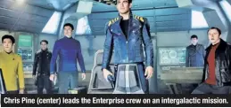  ??  ?? Chris Pine (center) leads the Enterprise crew on an intergalac­tic mission.