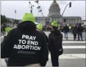  ?? JOCELYN GECKER — THE ASSOCIATED PRESS ?? In this Saturday file photo, anti-abortion demonstrat­ors gather at San Francisco City Hall for the 13th annual Walk for Life West Coast march. The collapse of the Republican health care overhaul in March 2017 was a sharp setback for anti-abortion...