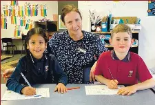  ?? ?? Mrs Fiona Clark with two of her students, Gurleen Kaur and Alexander Bate.