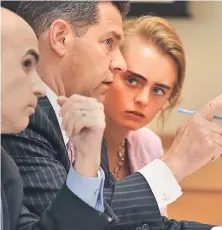  ?? HERALDPOOL­PHOTO ?? BENCH TRIAL: Michelle Carter listens to her attorney Joseph Cataldo in Taunton Juvenile Court yesterday. Carter’s defense is arguing Conrad Roy III would have committed suicide regardless of Carter’s encouragem­ent.
