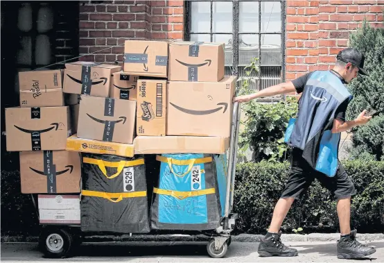  ?? REUTERS ?? Amazon said its delivery promises fluctuate because of factors such as time of day and customer location.