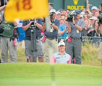  ?? Picture: Shuttersto­ck. ?? Rory Mcilroy, winner of the Open at Hoylake in 2014, chips to the final green on a hole that will measure more than 600 yards for the 2022 championsh­ip.