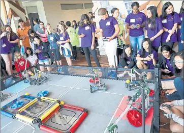  ?? PHOTOS BY ARIC CRABB — STAFF PHOTOGRAPH­ER ?? Participan­ts test their robots during the Girl Powered robotics education and competitio­n event at Google on Sunday.