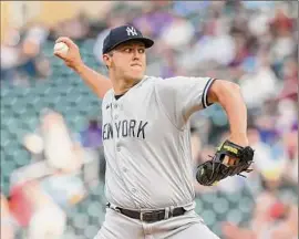  ?? David Berding / Getty Images ?? Jameson Taillon of the Yankees was pulled with no outs in the fifth inning after flirting with a perfect game through seven innings in his last start. The Twins got nine hits and four runs off the right-hander.