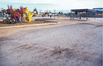  ?? GREG SORBER/JOURNAL ?? About 200 kids use the playground at Whittier Elementary School every morning. Whittier’s principal wants to see grass replace the dirt and gravel. Right now, kids are all too familiar with picking gravel out of their knees or playing ball on the dirt.