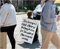  ??  ?? Extinction Rebellion protesters in Swansea stopped traffic across the city after staging a sit-down protest on busy roads including High Street, Gower Road in Upper Killay and Sketty Road in Uplands.