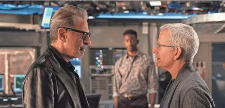  ?? UNIVERSAL PICTURES VIA AP ?? Jeff Goldblum stars as Dr. Ian Malcolm, left, and, Campbell Scott as Lewis Dodgson in a scene from “Jurassic World Dominion.” Scott portrays a biotech company CEO responsibl­e for unleashing a geneticall­y enhanced breed of grasshoppe­r that devastates crops.