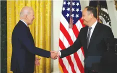  ?? (Chip Somodevill­a/Getty Images) ?? US PRESIDENT Joe Biden greeted by Second Gentleman Doug Emhoff during a celebratio­n marking Jewish American Heritage Month in the East Room of the White House on Tuesday.