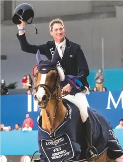  ??  ?? CSI5*-W Madrid, Spain Daniel Deusser takes World Cup victory with Tobago Z, his second this season