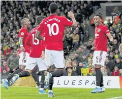  ?? REUTERS ?? United’s Anthony Martial, right, reacts after scoring against Norwich City.