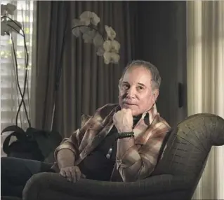  ?? Rick Loomis Los Angeles Times ?? “I’M NEVER going to retire” from making music, says singer-songwriter Paul Simon, whose latest album, the sonically adventurou­s “Stranger to Stranger,” has been critically well received.