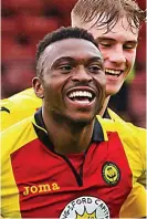  ??  ?? ALL SMILES: Amoo celebrates his goal which doubled Thistle’s advantage