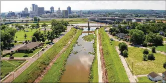  ?? TY GREENLEES / STAFF ?? Five Rivers MetroParks has partnered with the city of Dayton and Miami Conservanc­yDistrict to develop a comprehens­ive 20-yearmaster plan for 12miles of river corridor in greater downtownDa­yton. The DowntownDa­ytonRiverf­rontMaster Planwaspre­sentedonTu­esday.