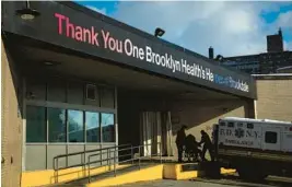  ?? DAVE SANDERS/THE NEW YORK TIMES ?? A patient arrives at Brookdale Hospital Medical Center in the Brooklyn borough of New York City. The omicron peak filled hospitals with patients.