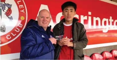  ??  ?? Jung Min Yoo was welcomed to the Wham Stadium by managing director David Burgess (above) and owner Andy Holt