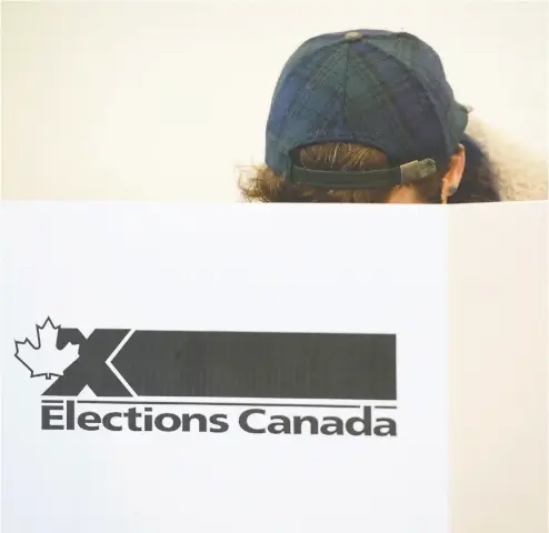  ?? GRAHAM HUGHES / THE CANADIAN PRESSFILES ?? Canadian federal elections use hand- counted paper ballots only — a fact U. S. President Donald Trump used to back his claim that voting machines are untrustwor­thy. This was “quite unfortunat­e,” Canada’s chief electoral officer says.