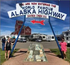  ??  ?? Getting closer! Day 6: Mile 0 of the Alaska Highway in Dawson Creek, BC.