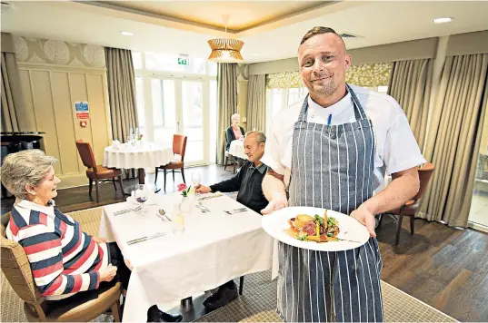  ??  ?? Robert Quehan, the head chef of the Redwood Bistro in Eastleigh, Hants, said he had been excited by the challenge of winning an AA rosette while catering to care home residents’ needs