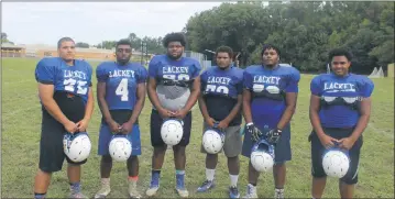  ?? STAFF PHOTO BY AJ MASON ?? The “Big Six,” as referred to by head coach John Lush will lead the Lackey football team on the offensive and defensive lines this season. Pictured from left are Davon Washington, Chris Thompson, Dontrel Thompson, Julian Lyons, Elijah Lane and Willie...