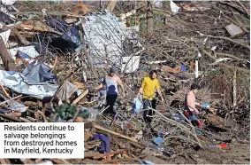  ?? ?? Residents continue to salvage belongings from destroyed homes in Mayfield, Kentucky