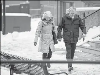  ?? CP PHOTO ?? Dennis Oland and his wife Lisa arrive at the Law Courts in Saint John, N.B. on Tuesday.