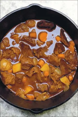  ?? COURTESY OF LYNDA BALSLEV ?? This hearty braised beef stew gets its flavor from dark beer.