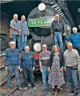  ?? WILLIAM PARRISH ?? Fond memories: Essex Locomotive Society original shareholde­rs and volunteers at the North Yorkshire Moors Railway station of Pickering on September 17 after travelling behind SR S15 No. 825, complete with appropriat­e headboard, in commemorat­ion of the start of the restoratio­n of fellow class member No. 841 exactly 50 years ago.