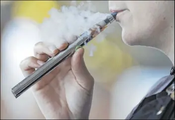  ?? The Associated Press file ?? Oregon’s six-month ban on flavored vape product sales will take effect Tuesday.