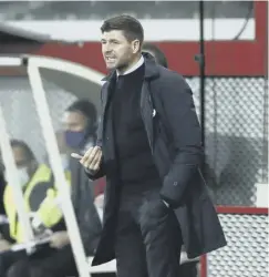  ??  ?? 0 Rangers manager Steven Gerrard watches from the touchline