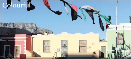  ?? PICTURE: HENK KRUGER/AFRICAN NEWS AGENCY (ANA) ?? Pro Palestinia­n banners fly across Wale Street in Bo-Kaap.