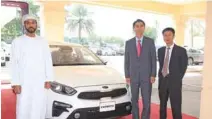  ??  ?? Saud Mohammed Bahwan along with Yoon, Tae-Hyeon and Y.J. Kim with the all-new Cerato