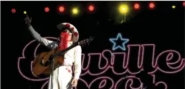  ?? KEITH BIRMINGHAM — STAFF PHOTOGRAPH­ER ?? Orville Peck performs during the Palomino Festival at Brookside Park in front of the Rose Bowl in Pasadena on Saturday. A performanc­e from Willie Nelson highlighte­d the show.