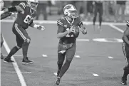  ?? ADRIAN KRAUS] ?? Buffalo Bills quarterbac­k Josh Allen (17) looks for an open receiver during Monday afternoon's game against the Kansas City Chiefs in Orchard Park, N.Y. [AP PHOTO/