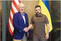  ?? UKRAINIAN PRESIDENTI­AL PRESS OFFICE VIA AP ?? Ukrainian President Volodymyr Zelenskyy and Senate Minority Leader Mitch McConnell, R-Ky., in Kyiv, Ukraine, on Saturday. McConnell has said there is bipartisan support in Congress for helping Ukraine.