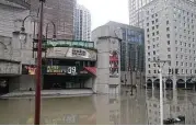  ?? Thomas B. Shea / AFP/Getty Images ?? Houston’s Theatre District is flooded as the city battles with Tropical Storm Harvey.