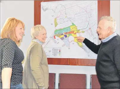  ?? TERRENCE MCEACHERN/THE GUARDIAN ?? Borden-Carleton residents Barbara Wood, left, Bonnie Martin and Mayor Dean Sexton discuss possible outcomes that might be revealed in the final draft of the town’s master spatial plan when it is released on Dec. 5.