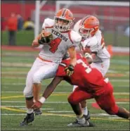  ?? GENE WALSH — DIGITAL FIRST MEDIA ?? Perk Valley’s Jon Moccia works to elude an Upper Dublin defender during their game on Sept. 1.