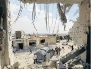  ?? /AFP ?? Hollow victory: Destroyed buildings in the town of al-Habit, on the southern edges of Idlib, on Sunday after Syrian bombings.